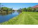 Scenic view of waterfront with lush green landscape at 1720 Kestral Park S Way # 49, Sarasota, FL 34231