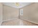 Neutral bedroom with tile flooring and plenty of light at 19138 Kirella St, Venice, FL 34293