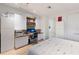 Bedroom featuring a built-in desk with shelving and storage, alongside neutral decor at 238 Island Cir, Sarasota, FL 34242