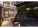 A unique residence with a treehouse and adjacent to the house is a modern ladder that accesses the structure at 238 Island Cir, Sarasota, FL 34242
