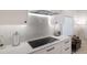 Modern kitchen features sleek countertops, stainless steel appliances, and stylish backsplash at 238 Island Cir, Sarasota, FL 34242