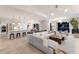 Expansive living room and kitchen, perfect for entertaining, with modern decor and plenty of natural light at 238 Island Cir, Sarasota, FL 34242