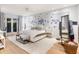 Spacious main bedroom with a ceiling fan and French doors leading to an outdoor balcony at 238 Island Cir, Sarasota, FL 34242