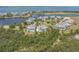 Breathtaking aerial view showcasing waterfront community and stunning scenery at 241 Sapphire Lake Dr # 201, Bradenton, FL 34209