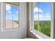 Bathroom features shiplap walls and windows with lovely views at 241 Sapphire Lake Dr # 201, Bradenton, FL 34209