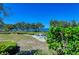 Short walk to the beach through beautifully landscaped common area at 241 Sapphire Lake Dr # 201, Bradenton, FL 34209