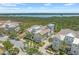Charming home with a tower feature, landscaped grounds, and picturesque views of the surrounding landscape at 241 Sapphire Lake Dr # 201, Bradenton, FL 34209