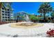 Community splash fountain surrounded by lush plantings, a relaxing focal point at 241 Sapphire Lake Dr # 201, Bradenton, FL 34209