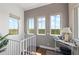 Hallway features hardwood floors, three windows with a beautiful view and neutral paint at 241 Sapphire Lake Dr # 201, Bradenton, FL 34209