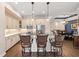 Modern kitchen featuring stainless steel appliances and island seating at 241 Sapphire Lake Dr # 201, Bradenton, FL 34209