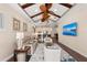 Open floor plan featuring modern interior design, kitchen access, and ceiling fans at 241 Sapphire Lake Dr # 201, Bradenton, FL 34209