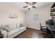 Office with wood floors, sofa, and modern lighting at 241 Sapphire Lake Dr # 201, Bradenton, FL 34209