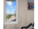 A bright window provides a picturesque view of the home's surroundings at 241 Sapphire Lake Dr # 201, Bradenton, FL 34209