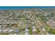 Scenic aerial view of community, highlighting its location near waterways and mature trees at 301 Angelico Dr, Nokomis, FL 34275