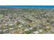 Stunning aerial view of community with waterways, with the property of interest circled at 301 Angelico Dr, Nokomis, FL 34275