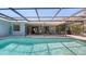 Enjoy the outdoor living with this inviting pool and covered patio area, perfect for relaxation and entertaining at 301 Angelico Dr, Nokomis, FL 34275