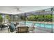 Inviting screened-in lanai with pool and ample seating, perfect for outdoor relaxation and entertaining at 301 Angelico Dr, Nokomis, FL 34275