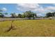 Large backyard with white fence and shed at 3090 6Th St, Sarasota, FL 34237