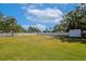 Large backyard with white fence and ample space at 3090 6Th St, Sarasota, FL 34237