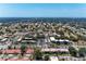 Aerial view of a residential community with golf course, highlighting lush landscaping and home proximity at 3336 Pembrook Dr, Sarasota, FL 34239