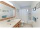 Bathroom with a single sink vanity and shower-tub combo at 3336 Pembrook Dr, Sarasota, FL 34239