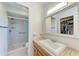 Bathroom with single sink, walk-in shower and large mirror and closet at 3336 Pembrook Dr, Sarasota, FL 34239