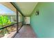 Bedroom with hardwood floors, ceiling fan, and natural light from window at 3336 Pembrook Dr, Sarasota, FL 34239
