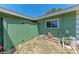 Exterior view showing a storage shed, tile roof, and exterior window at 3336 Pembrook Dr, Sarasota, FL 34239