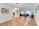 Open floor plan with view from the entry to the living room and kitchen, filled with natural light at 3336 Pembrook Dr, Sarasota, FL 34239