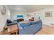 Comfortable living room with hardwood floors, recessed lighting, and stylish furnishings offers a cozy gathering space at 3336 Pembrook Dr, Sarasota, FL 34239