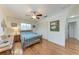 Cozy main bedroom with hardwood floors, closet space, and natural lighting at 3336 Pembrook Dr, Sarasota, FL 34239