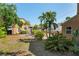 Expansive backyard with lush tropical landscaping and potential for outdoor living and entertainment at 344 N Lantana N Ave, Sarasota, FL 34243
