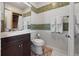 Bathroom with mosaic tiles, modern vanity, and ample lighting at 344 N Lantana N Ave, Sarasota, FL 34243