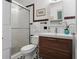 Well-appointed bathroom with a modern vanity, glass-enclosed shower, and classic tile work at 344 N Lantana N Ave, Sarasota, FL 34243