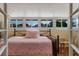 Bright bedroom featuring multiple windows providing lots of natural light and a comfortable sleeping space at 344 N Lantana N Ave, Sarasota, FL 34243