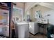Functional laundry room with a utility sink, washer, and dryer at 344 N Lantana N Ave, Sarasota, FL 34243
