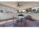 Covered patio area ideal for outdoor dining, featuring a ceiling fan at 344 N Lantana N Ave, Sarasota, FL 34243
