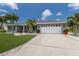 Lovely single-story home featuring a two-car garage and inviting curb appeal at 3889 Canopy Way, Sarasota, FL 34235