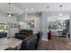 Spacious living room features vaulted ceilings and an open concept design at 3889 Canopy Way, Sarasota, FL 34235