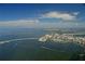 Stunning aerial view of Sarasota Bay featuring bridges, boats, cityscape, and expansive waterfront at 430 Kumquat Ct # 202, Sarasota, FL 34236