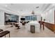 Bright amenity room featuring a large island, modern seating, and a spacious layout for social gatherings at 4356 Highland Oaks Cir # 3, Sarasota, FL 34235