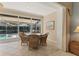 Breakfast nook area featuring a view to the outdoor pool and patio at 4356 Highland Oaks Cir # 3, Sarasota, FL 34235