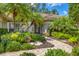 Close up of the front entrance and landscaping at 4356 Highland Oaks Cir # 3, Sarasota, FL 34235