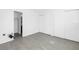 Bright bedroom features closet with sliding doors and tile flooring at 4444 Swift Rd # 25, Sarasota, FL 34231