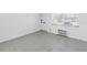 Bright and open living space with tile floors and a window A/C unit at 4444 Swift Rd # 25, Sarasota, FL 34231