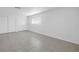 Bright open-concept living space with tile floors and large sliding closet at 4444 Swift Rd # 25, Sarasota, FL 34231