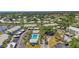 Aerial view of the community showcasing the pool, clubhouse, and well-maintained landscaping at 446 Cerromar Rd # 291, Venice, FL 34293