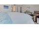 Bedroom with a view to the en-suite bathroom featuring coordinated decor and lots of space at 446 Cerromar Rd # 291, Venice, FL 34293