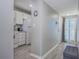 Inviting entryway leading to a clean kitchen with modern appliances and a cozy breakfast nook, creating a warm welcome at 446 Cerromar Rd # 291, Venice, FL 34293