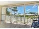 Screened lanai with lovely water views and lush landscaping offers peaceful outdoor living at 446 Cerromar Rd # 291, Venice, FL 34293